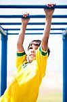 Smart Kid Playing On Jungle Gym Stock Photo