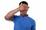 Smart Young Guy Hiding His Eye Stock Photo