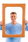 Smiling Adult Man With Frame Stock Photo