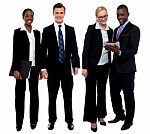 Smiling Business Team Using Tablet Stock Photo