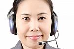 Smiling Call Centre Lady Stock Photo