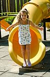 Smiling Child Jumping Stock Photo