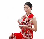 Smiling Chinese Girl Holding Cup Of Tea Stock Photo