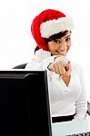 Smiling Christmas Woman Pointing Stock Photo