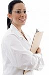 Smiling Doctor Holding Clipboard Stock Photo
