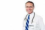 Smiling Doctor With Stethoscope Stock Photo