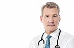 Smiling Experienced Doctor Isolated Over White Stock Photo