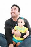 Smiling Father With Baby Stock Photo