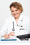 Smiling Female Physician Stock Photo