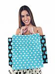 Smiling Girl Holding Shopping Bags Stock Photo