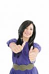 Smiling Girl Showing Thumbs Up Stock Photo