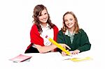 Smiling Girls Learning Books Stock Photo
