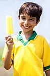 Smiling Kid Holding An Ice-cream Stock Photo