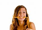 Smiling Lady Biting Pencil Stock Photo