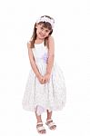 Smiling Little Girl In White Dress Stock Photo