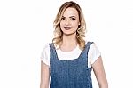 Smiling Lovely Lady In Denims Stock Photo