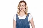 Smiling Lovely Lady In Denims Stock Photo