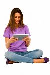 Smiling Teenage Girl Using Ipad Stock Photo