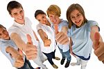 Smiling Teenagers Showing Thumbs Up Stock Photo