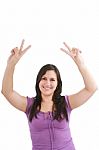 Smiling Woman Making Victory Sign Stock Photo