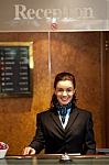 Smiling Woman Receptionist Stock Photo