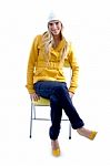 Smiling Woman Sitting On Chair Stock Photo