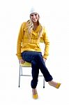Smiling Woman Sitting On Chair Stock Photo