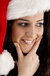 Smiling Woman Wearing Christmas Hat Stock Photo
