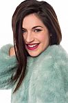 Smiling Woman With Fur Coat Stock Photo