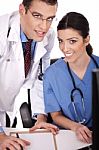 Smiling Young Doctors Stock Photo
