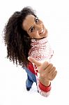 Smiling Young Girl Showing Thumb Up Stock Photo
