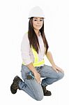 Smiling Young Lady Wearing Hard Hat Stock Photo