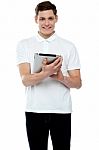 Smiling Young Man Using Tablet Pc Stock Photo
