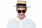 Smiling Young Man Wearing Hat Stock Photo