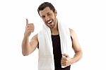 Smiling Young Man With Thumbs Up Stock Photo