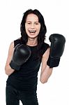 Smiling Young Slim Female Boxer Stock Photo