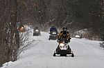 Snowmobiles On Trail Stock Photo