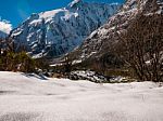 Snowy Mountains In The Wilderness  With Blue Sky Stock Photo