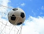 Soccer Ball In Goal Stock Photo