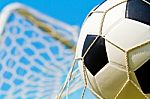 Soccer Ball In Net Stock Photo