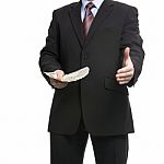 Some Unrecognizable Businessman In Suit Shows A Spread Of Cash A Stock Photo
