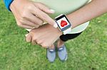 Sport Woman Touch On Hand Watch Health Application Stock Photo