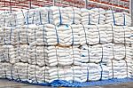 Stacked Sacks Of Meal In Warehouse Waiting For Transportation Stock Photo
