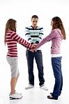 Standing Friends With Joined Hands Stock Photo