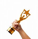 Star Award In Hand Isolated On White Background Stock Photo
