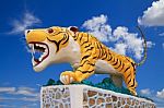 Statue Tiger On Blue Sky Stock Photo