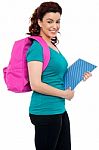 Student With Backpack And Notebook Stock Photo