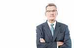 Successful Businessman With Folded Arms Stock Photo