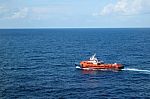Supply Boat Transfer Cargo To Oil And Gas Industry Stock Photo