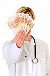 Surgeon Holding Money Stock Photo